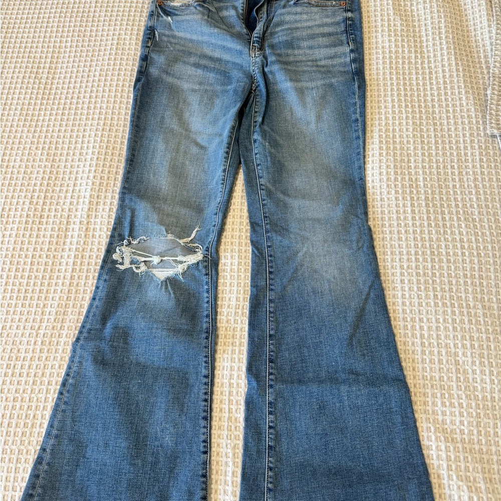 American Eagle Outfitters Blue Flare Jeans with Distressed Details